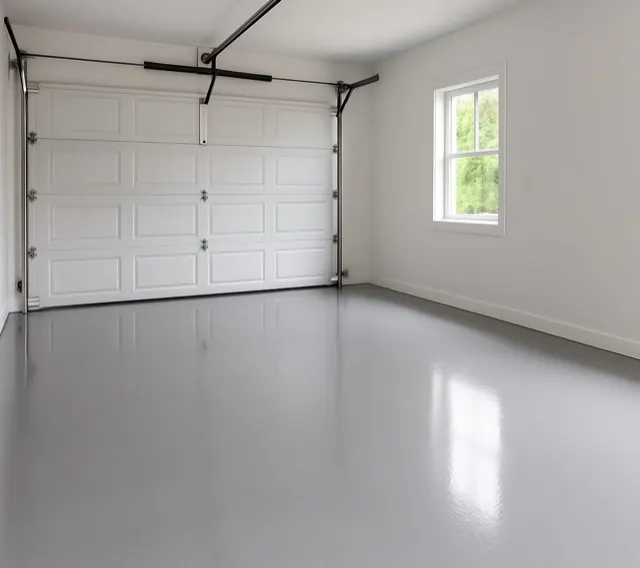 Garage met een gladde grijze vloercoating